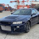 The Nissan Skyline GT-R R34 was produced from 1999 to 2002. This particular car, finished in the iconic Midnight Purple II (a color-shifting paint that appears deep blue or purple depending on the light), is one of only a few hundred examples produced in this specific shade, making it highly desirable from the moment it left the factory.